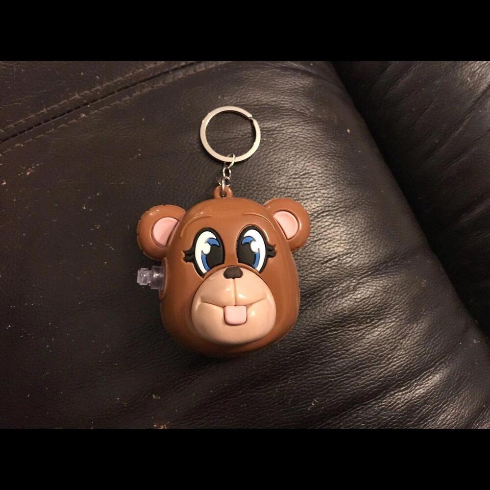 Jeremy Scott Keychain for Melissa funky monkey inflatable look backpack tag.